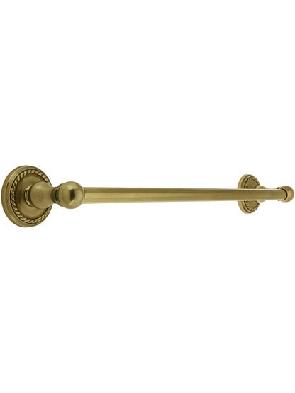 18 inch Brass Towel Bar with Rope Rosettes in Antique Brass.